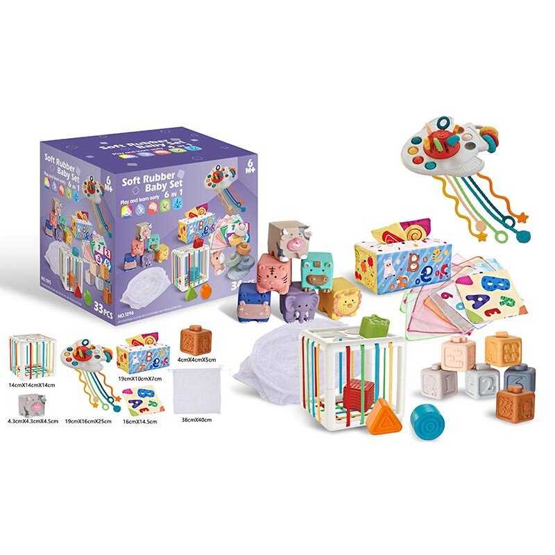 Набір для розвитку 1295 (18) 33 елементи, кубики, брязкальця, прорізувачі, серветки, мішечок, куб із формами, в коробці