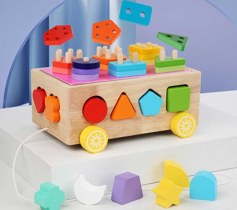 Каталка C 75630 (30)  дерев’яна, сортер, кілочки, в коробці